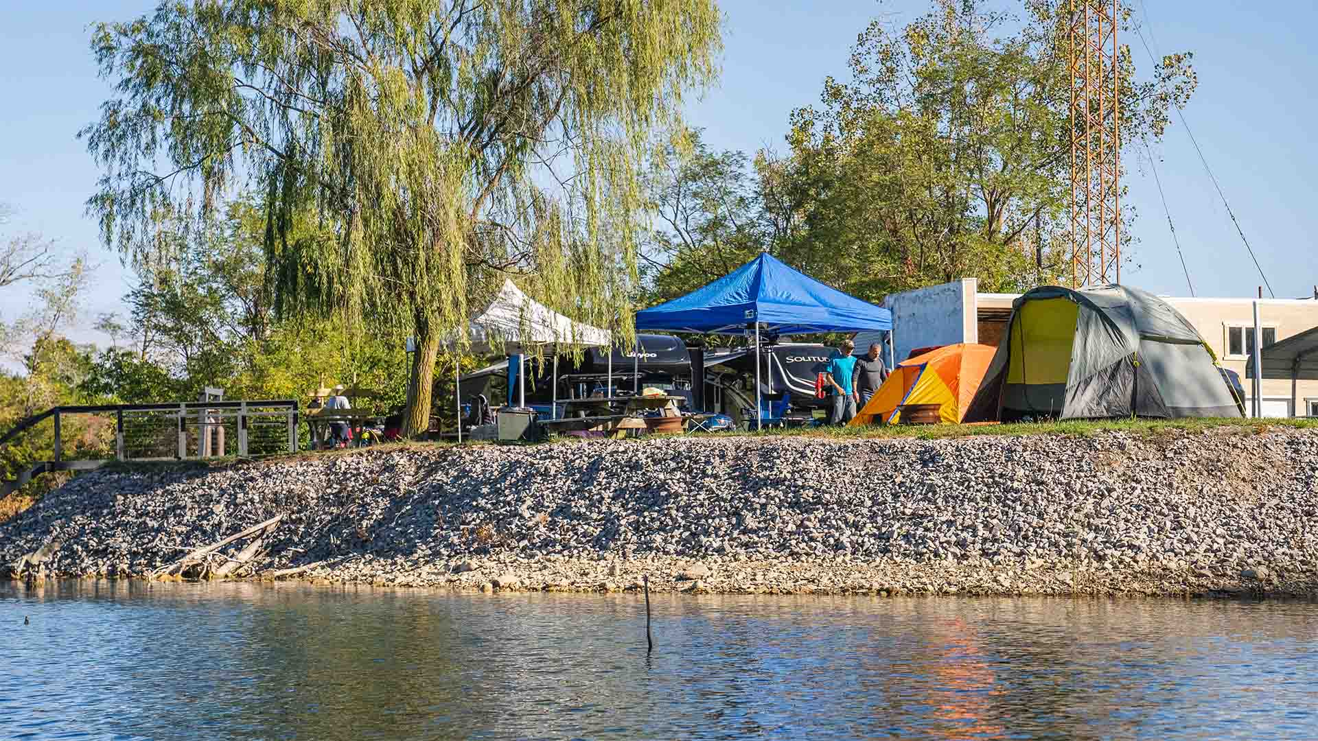 Tent camping sites at Gilboa Quarry with crystal-clear quarry waters in northwest Ohio