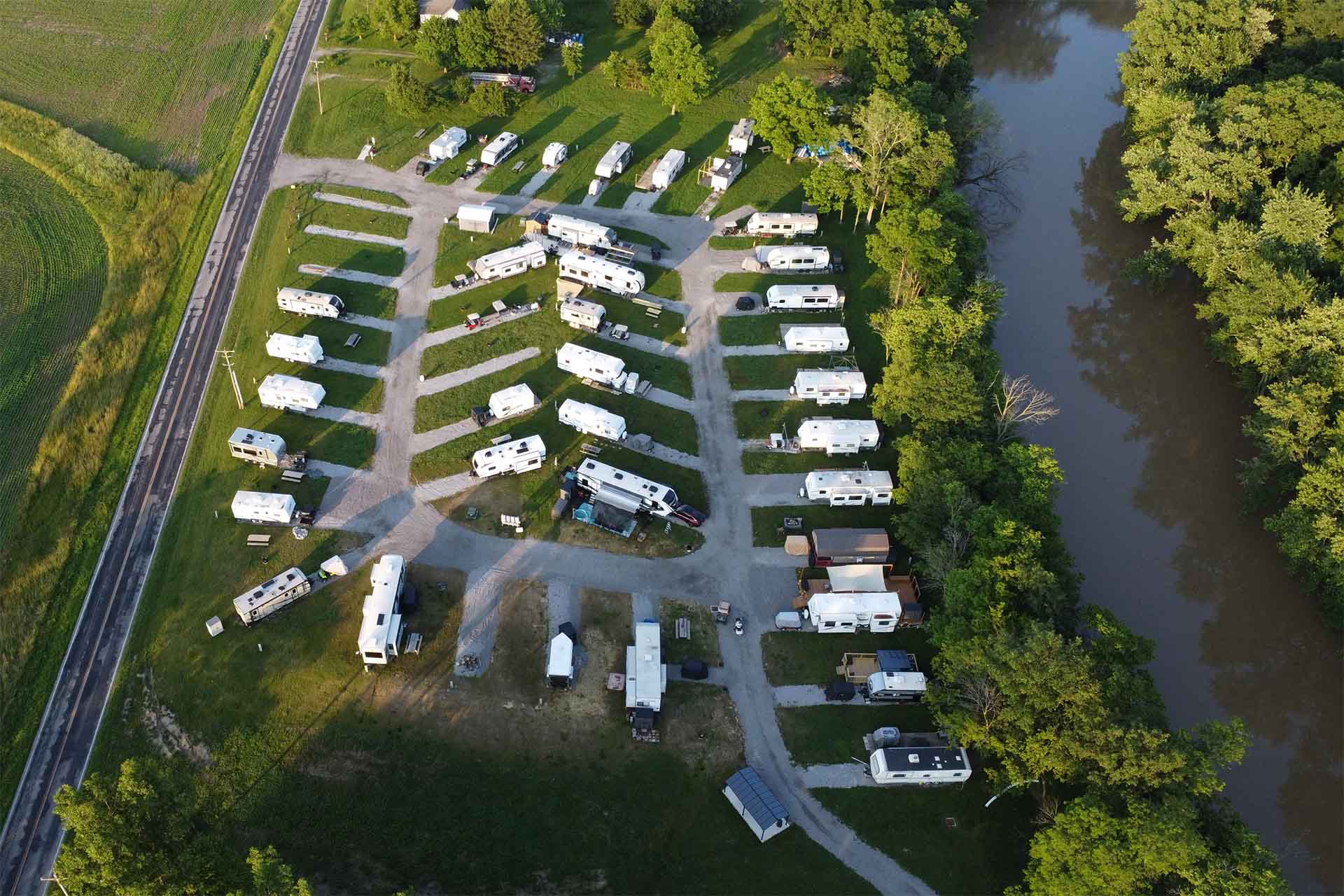 Aerial view of Gilboa Quarry RV park with full hookup sites and gravel pads for camping in northwest Ohio