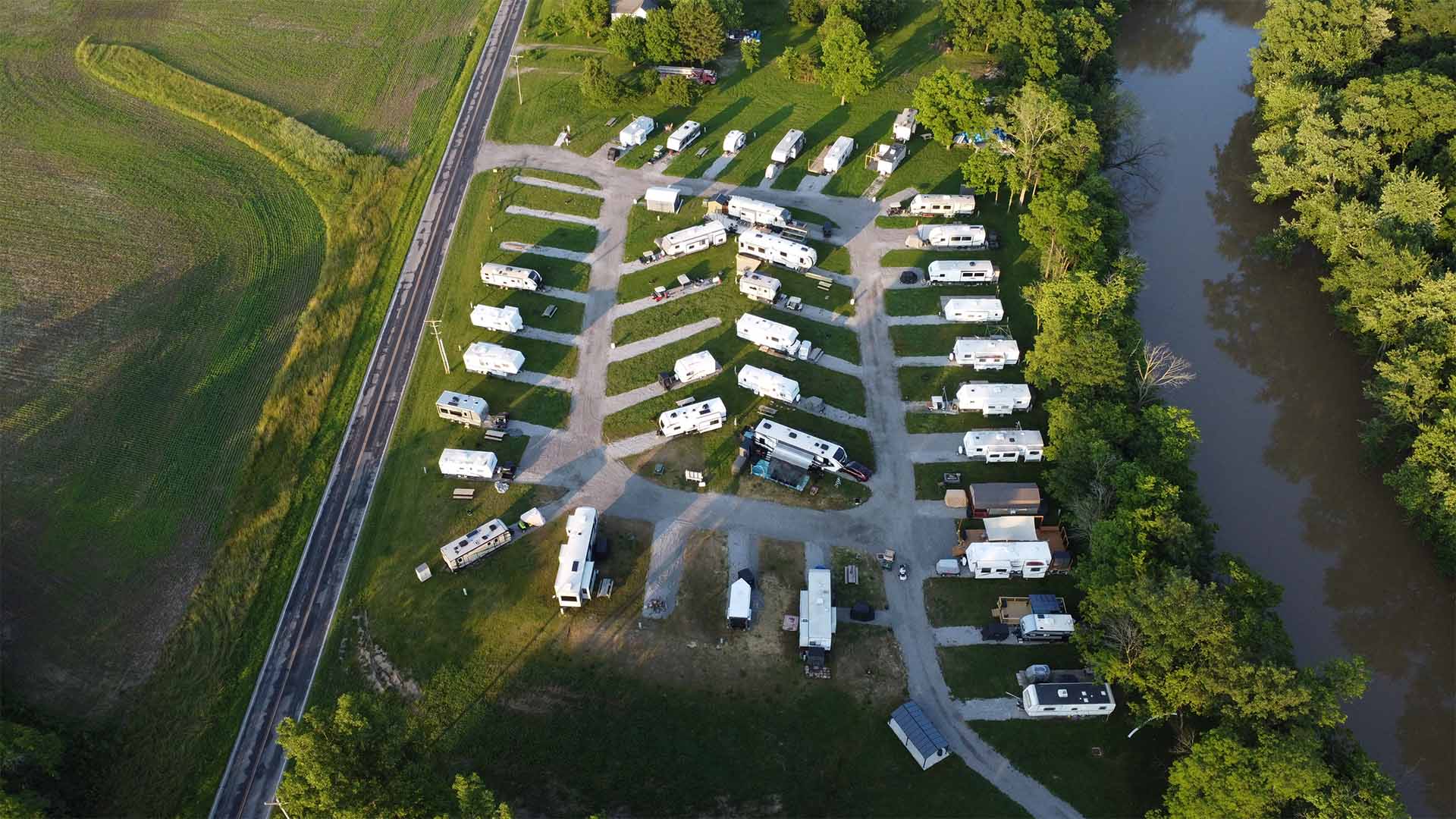 Aerial view of Gilboa Quarry RV park with full hookup sites and gravel pads for camping in northwest Ohio